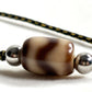 Tiger Tooth Dzi Bead String Necklace