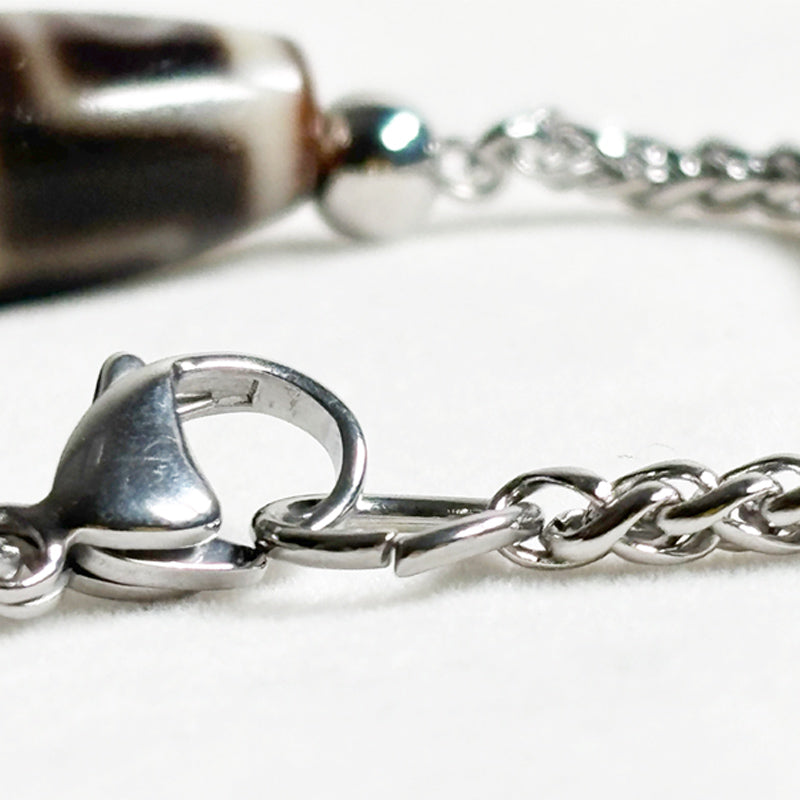 Four Eye Dzi Bead Bracelet