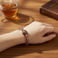 Garuda Dzi Bead w/ Red Rutilated Quartz Bangle